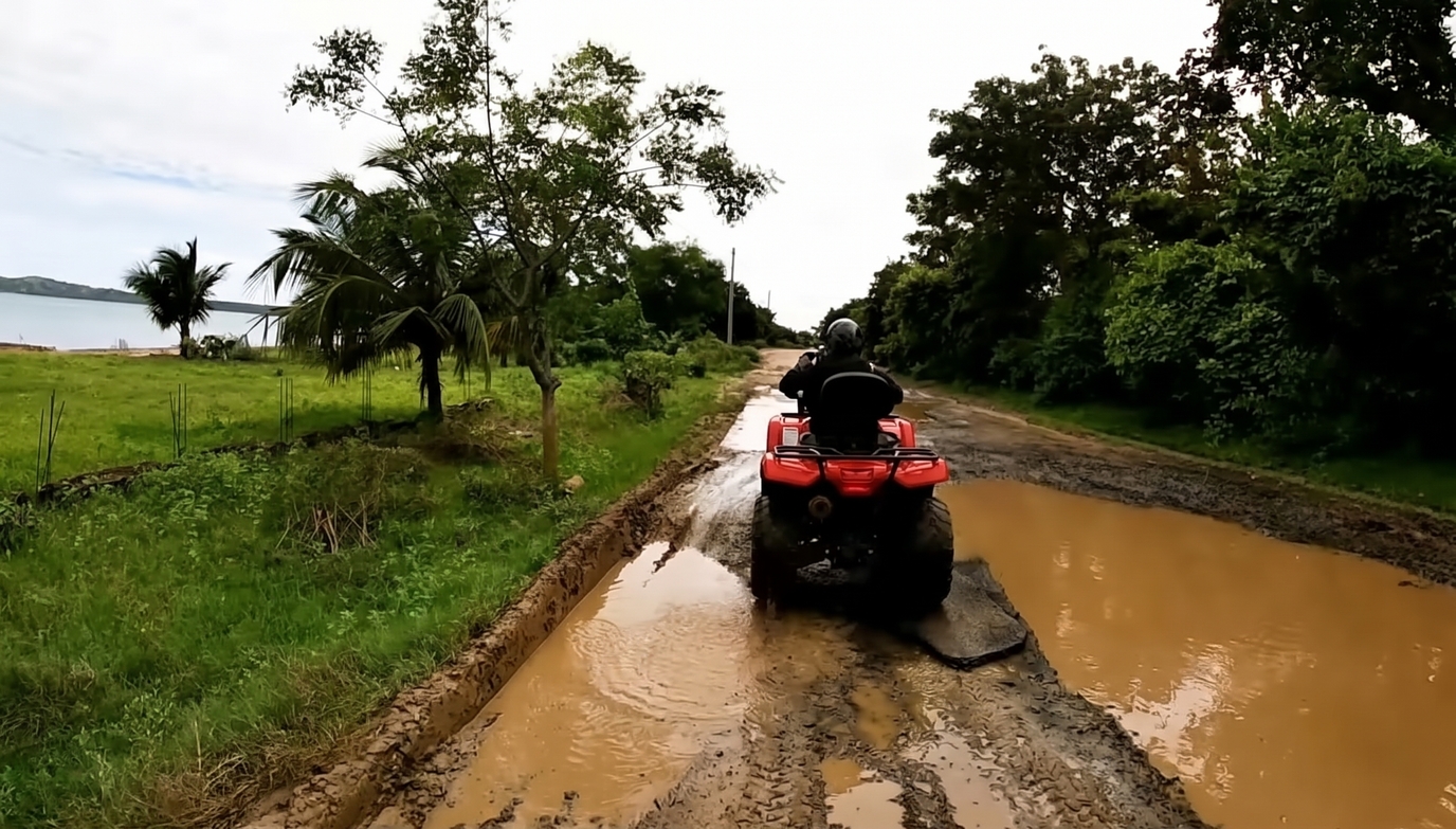 Quad dans la boue